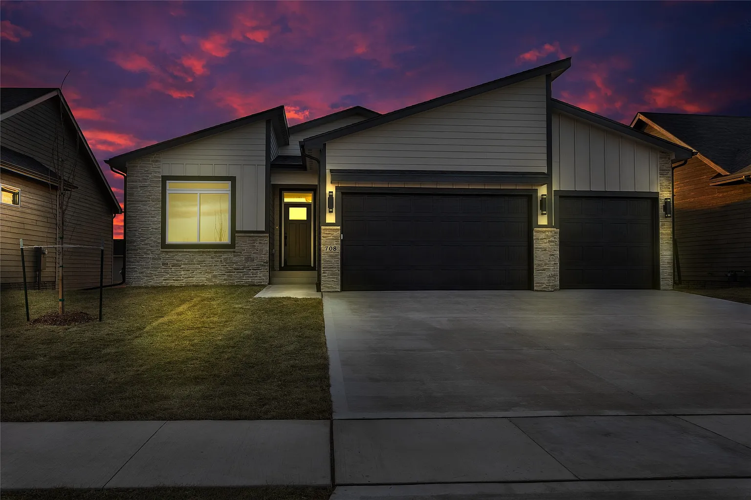 A DS Solid Construction custom home at twilight